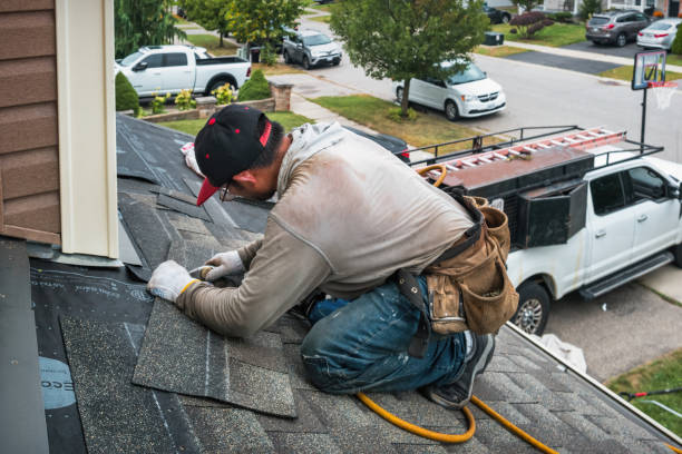 Professional Roof Replacement technician working in Hume, IL